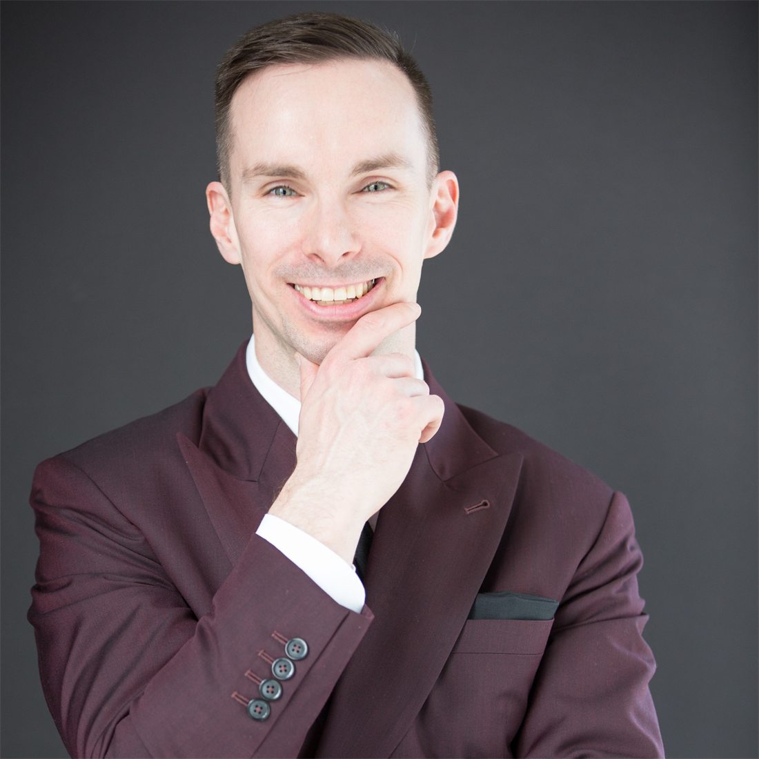 A confident, well-dressed professional in a tailored suit